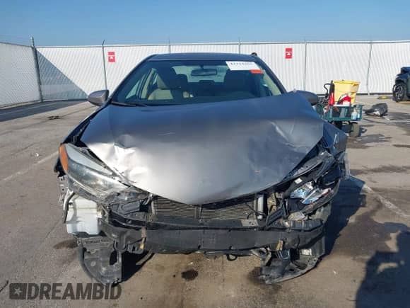 2016 Toyota Corolla L with VIN 5YFBURHE6GP419777, listed as a IAAI auction lot 43324965 with 210,732 mi miles and . Bid and sale history available at DreamBid. Image 13.