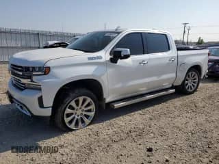2019 Chevrolet Silverado 1500 High Country с VIN 3GCUYHEL0KG122674, выставлен на аукционе Copart как лот 64088455 с пробегом 167 051 миль миль и На запчасти • Non repairable. История ставок и продаж доступна на DreamBid. Изображение 1.