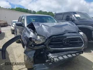 2018 Toyota Tacoma SR5 with VIN 3TMAZ5CN0JM074127, listed as a IAAI auction lot 42528246 with 59,848 mi miles and . Bid and sale history available at DreamBid. Image 1.