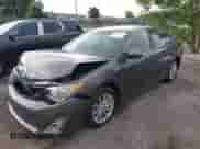 2013 Toyota Camry LE z VIN 4T1BD1FKXDU066965, wystawiony jako IAAI lot #43027264 z przebiegiem 98 455 mil mil oraz . Historia ofert i sprzedaży dostępna na DreamBid. Obrazek 17.