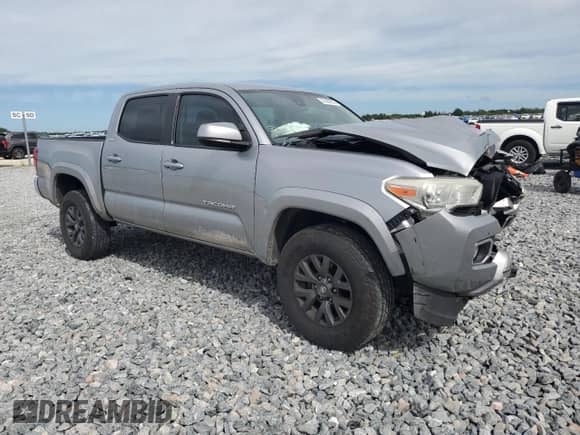 2021 Toyota Tacoma SR5 with VIN 5TFAZ5CN3MX098288, listed as a Copart auction lot 81489995 with 80,073 mi miles and Non repairable. Bid and sale history available at DreamBid. Image 4.