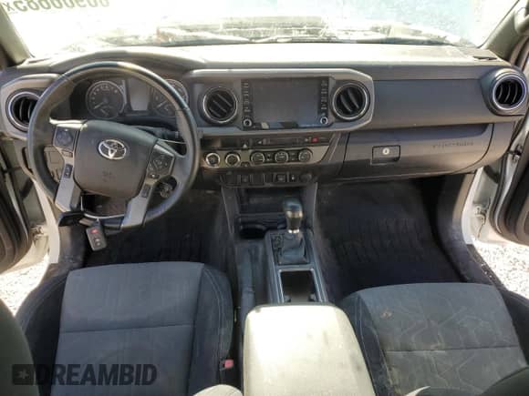 2022 Toyota Tacoma SR z VIN 3TYSZ5ANXNT090384, wystawiony jako Copart lot #80906685 z przebiegiem Nie podano mil oraz Szkoda całkowita • Salvage title. Historia ofert i sprzedaży dostępna na DreamBid. Obrazek 8.