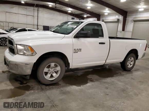 2023 Ram 1500 with VIN 3C6JR7EG8PG675357, listed as a Copart auction lot 60595825 with 33,043 mi miles and Salvage title. Bid and sale history available at DreamBid. Image 1.