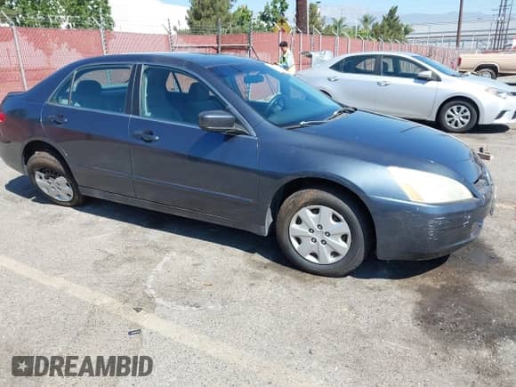 2003 Honda Accord LX with VIN 3HGCM56363G708464, listed as a IAAI auction lot 42990862 with 220,440 mi miles and . Bid and sale history available at DreamBid. Image 1.