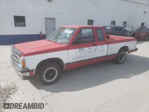 1991 Chevrolet S-10 z VIN 1GCCS19Z4M0204465, wystawiony jako Copart lot #77198684 z przebiegiem 147 796 mil mil oraz Szkoda całkowita • Salvage title. Historia ofert i sprzedaży dostępna na DreamBid. Obrazek 1.