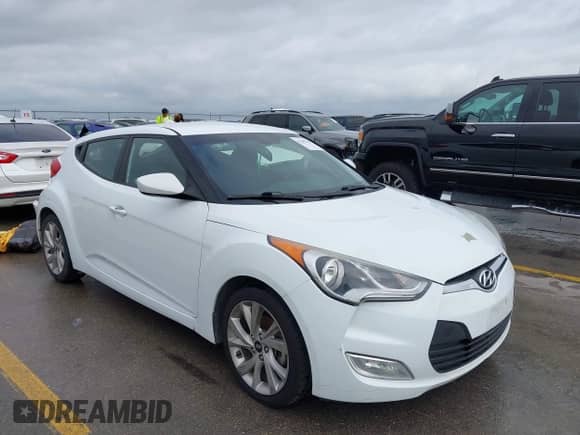 2017 Hyundai Veloster Value Edition z VIN KMHTC6AD7HU304774, wystawiony jako IAAI lot #42693195 z przebiegiem 102 427 mil mil oraz . Historia ofert i sprzedaży dostępna na DreamBid. Obrazek 1.