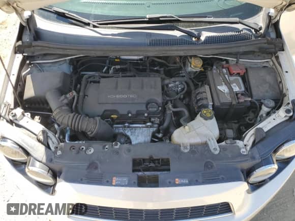 2014 Chevrolet Sonic Premier с VIN 1G1JF6SBXE4185946, выставлен на аукционе Copart как лот 70014525 с пробегом 135 094 миль миль и Списание • Salvage title. История ставок и продаж доступна на DreamBid. Изображение 11.