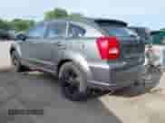 2011 Dodge Caliber Uptown with VIN 1B3CB9HB9BD254451, listed as a IAAI auction lot 42247772 with 188,757 mi miles and . Bid and sale history available at DreamBid. Image 3.