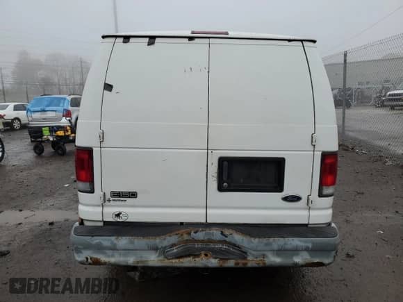 2001 Ford Econoline Cargo z VIN 1FTRE142X1HB27593, wystawiony jako Copart lot #83827154 z przebiegiem 190 761 mil mil oraz Szkoda całkowita • Salvage title. Historia ofert i sprzedaży dostępna na DreamBid. Obrazek 6.