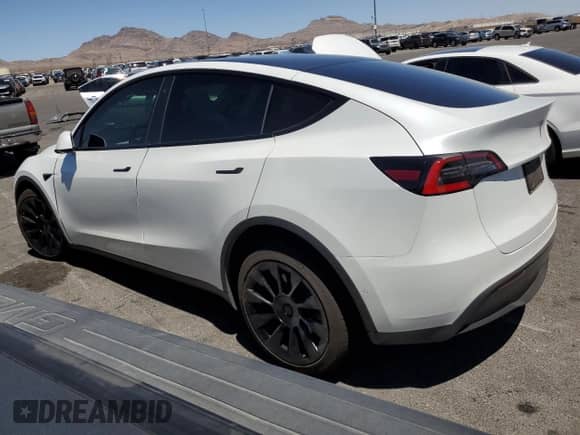 2021 Tesla Model Y Long Range with VIN 5YJYGDEEXMF112483, listed as a Copart auction lot 68286045 with 54,154 mi miles and Salvage title. Bid and sale history available at DreamBid. Image 2.