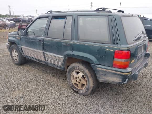 1993 Jeep Grand Cherokee Limited z VIN 1J4GZ78S1PC525798, wystawiony jako IAAI lot #42572328 z przebiegiem 197 551 mil mil oraz . Historia ofert i sprzedaży dostępna na DreamBid. Obrazek 3.