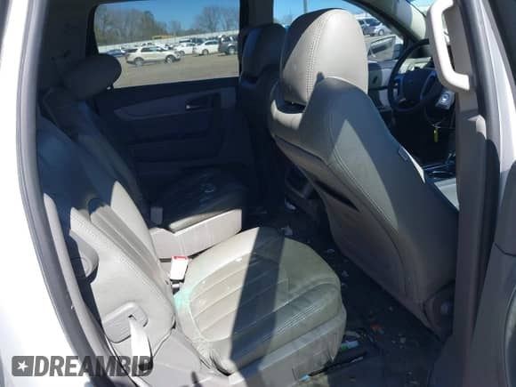 2017 Chevrolet Traverse LT z VIN 1GNKRHKD2HJ296360, wystawiony jako IAAI lot #41840589 z przebiegiem 140 479 mil mil oraz . Historia ofert i sprzedaży dostępna na DreamBid. Obrazek 8.