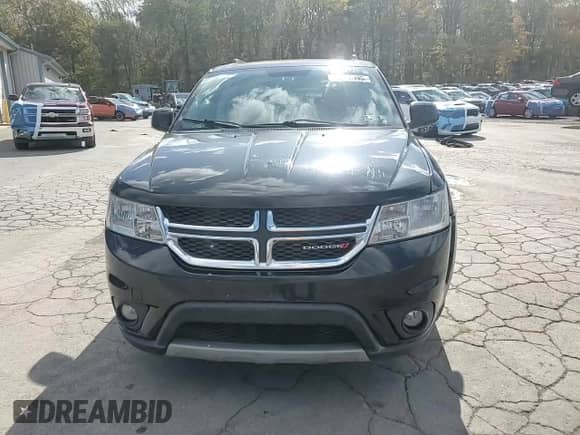 2013 Dodge Journey SXT with VIN 3C4PDCBGXDT716525, listed as a Copart auction lot 86057335 with 157,035 mi miles and Salvage title. Bid and sale history available at DreamBid. Image 14.