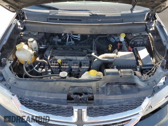 2013 Dodge Journey American Value z VIN 3C4PDCAB7DT701258, wystawiony jako Copart lot #58729024 z przebiegiem 107 366 mil mil oraz Szkoda całkowita • Salvage title. Historia ofert i sprzedaży dostępna na DreamBid. Obrazek 14.