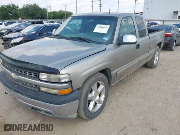 2002 Chevrolet Silverado 1500 LS with VIN 2GCEC19T221270290, listed as a IAAI auction lot 43084494 with 126,807 mi miles and . Bid and sale history available at DreamBid. Image 2.