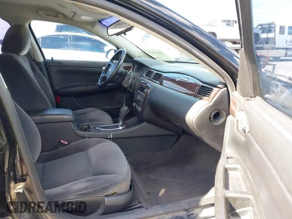 2014 Chevrolet Impala LS with VIN 2G1WA5E31E1164711, listed as a IAAI auction lot 43105422 with 69,960 mi miles and . Bid and sale history available at DreamBid. Image 5.