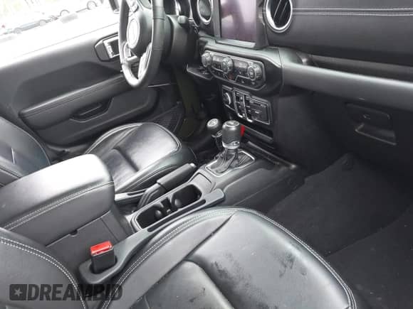 2023 Jeep Wrangler Sahara with VIN 1C4JJXP64PW684210, listed as a IAAI auction lot 42244388 with 23,622 mi miles and . Bid and sale history available at DreamBid. Image 5.