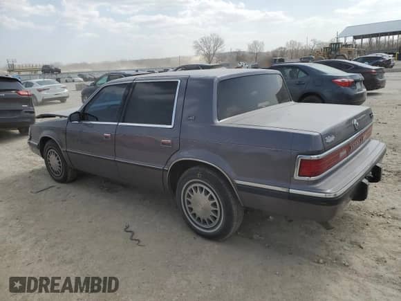 1993 Dodge Dynasty with VIN 1B3XC4638PD195963, listed as a Copart auction lot 49120625 with 86,825 mi miles and Salvage title. Bid and sale history available at DreamBid. Image 2.
