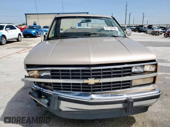 1988 Chevrolet Silverado 1500 с VIN 1GCDC14H5JZ284527, выставлен на аукционе Copart как лот 57114735 с пробегом 86 174 миль миль и Списание • Salvage title. История ставок и продаж доступна на DreamBid. Изображение 5.