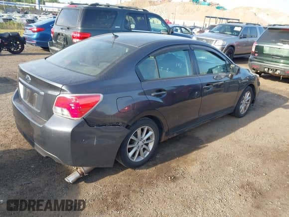 2012 Subaru Impreza Premium with VIN JF1GJAC65CH014439, listed as a IAAI auction lot 42783609 with 180,340 mi miles and . Bid and sale history available at DreamBid. Image 4.