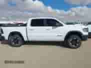 2022 Ram 1500 Rebel z VIN 1C6SRFLT4NN282636, wystawiony jako IAAI lot #42656360 z przebiegiem 38 884 mil mil oraz . Historia ofert i sprzedaży dostępna na DreamBid. Obrazek 13.