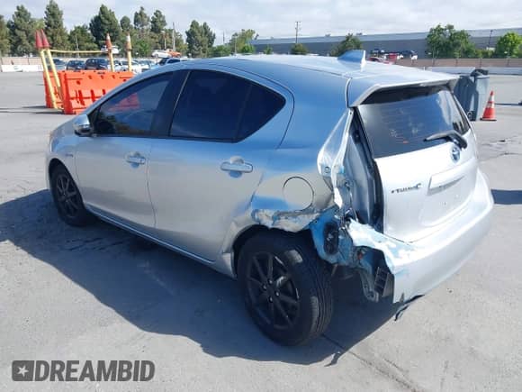 2015 Toyota Prius One z VIN JTDKDTB32F1099834, wystawiony jako IAAI lot #42310162 z przebiegiem 208 498 mil mil oraz . Historia ofert i sprzedaży dostępna na DreamBid. Obrazek 3.