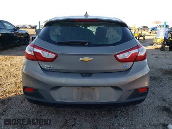 2018 Chevrolet Cruze LT z VIN 3G1BH6SE3JS636492, wystawiony jako Copart lot #80988884 z przebiegiem Nie podano mil oraz Szkoda całkowita • Salvage title. Historia ofert i sprzedaży dostępna na DreamBid. Obrazek 6.