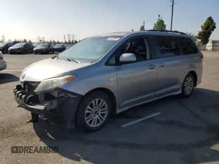 2012 Toyota Sienna SE with VIN 5TDXK3DC0CS189796, listed as a Copart auction lot 81947625 with 213,429 mi miles and Salvage title. Bid and sale history available at DreamBid. Image 1.