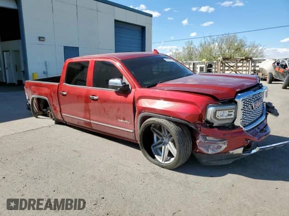 2018 GMC Sierra 1500 Denali with VIN 3GTU2PEC4JG218141, listed as a Copart auction lot 81679775 with 104,996 mi miles and Salvage title. Bid and sale history available at DreamBid. Image 4.