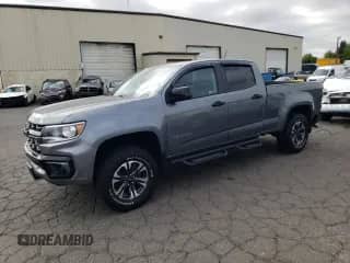 2021 Chevrolet Colorado 4WD Z71 with VIN 1GCGTDEN4M1223823, listed as a Copart auction lot 67643675 with 38,956 mi miles and Salvage title. Bid and sale history available at DreamBid. Image 1.