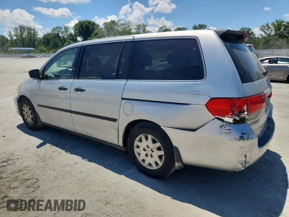 2010 Honda Odyssey LX с VIN 5FNRL3H2XAB014495, выставлен на аукционе Copart как лот 62425955 с пробегом 228 897 миль миль и Списание • Salvage title. История ставок и продаж доступна на DreamBid. Изображение 2.