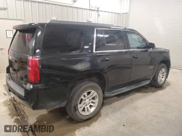 2019 Chevrolet Tahoe LT с VIN 1GNSKBKCXKR398197, выставлен на аукционе Copart как лот 70944045 с пробегом 136 584 миль миль и Списание • Salvage title. История ставок и продаж доступна на DreamBid. Изображение 3.