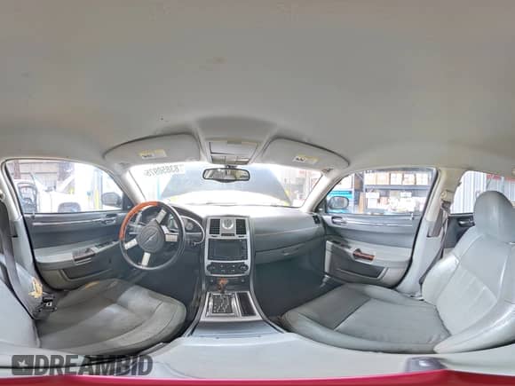 2005 Chrysler 300 C with VIN 2C3AA63H45H597778, listed as a Copart auction lot 83850975 with 128,599 mi miles and Salvage title. Bid and sale history available at DreamBid. Image 14.