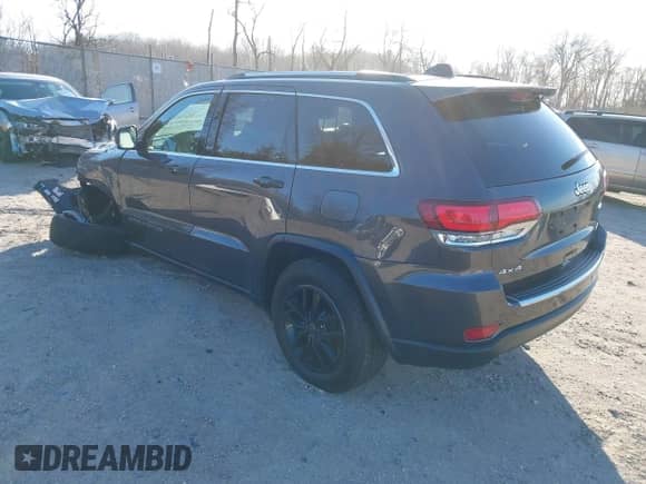2021 Jeep Grand Cherokee 80th Anniversary with VIN 1C4RJFBG5MC737412, listed as a IAAI auction lot 41753550 with 54,921 mi miles and . Bid and sale history available at DreamBid. Image 3.