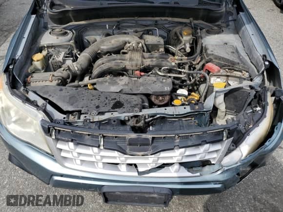 2012 Subaru Forester X Premium z VIN JF2SHADC7CH444981, wystawiony jako Copart lot #71629975 z przebiegiem 150 833 mil mil oraz Szkoda całkowita • Salvage title. Historia ofert i sprzedaży dostępna na DreamBid. Obrazek 11.