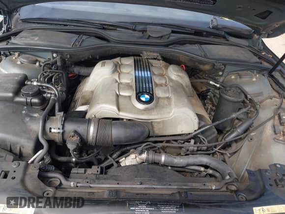 2003 BMW 7 Series 745i z VIN WBAGL63473DP68141, wystawiony jako IAAI lot #43402481 z przebiegiem Nie podano mil oraz . Historia ofert i sprzedaży dostępna na DreamBid. Obrazek 10.