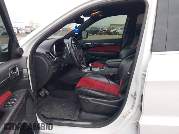 2015 Jeep Grand Cherokee SRT with VIN 1C4RJFDJ4FC882940, listed as a IAAI auction lot 43549108 with 18,901 mi miles and . Bid and sale history available at DreamBid. Image 5.