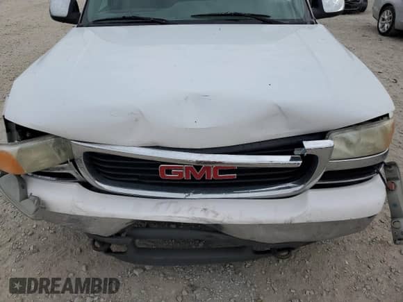 1999 GMC Sierra 1500 SL z VIN 1GTEC14V3XE544949, wystawiony jako Copart lot #68512264 z przebiegiem Nie podano mil oraz Szkoda całkowita • Salvage title. Historia ofert i sprzedaży dostępna na DreamBid. Obrazek 11.