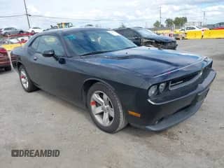 2014 Dodge Challenger R/T z VIN 2C3CDYBT6EH229572, wystawiony jako IAAI lot #43326778 z przebiegiem 125 314 mil mil oraz . Historia ofert i sprzedaży dostępna na DreamBid. Obrazek 1.
