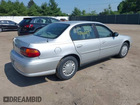 2005 Chevrolet Malibu Classic z VIN 1G1ND52F05M157948, wystawiony jako IAAI lot #42802810 z przebiegiem 61 473 mil mil oraz . Historia ofert i sprzedaży dostępna na DreamBid. Obrazek 4.