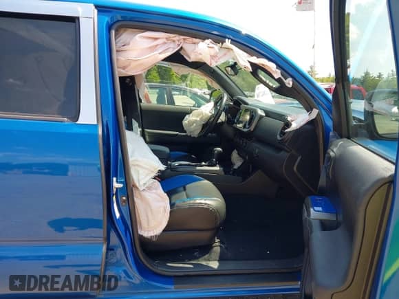 2018 Toyota Tacoma SR z VIN 3TMCZ5AN0JM126724, wystawiony jako IAAI lot #42842788 z przebiegiem 91 776 mil mil oraz . Historia ofert i sprzedaży dostępna na DreamBid. Obrazek 5.