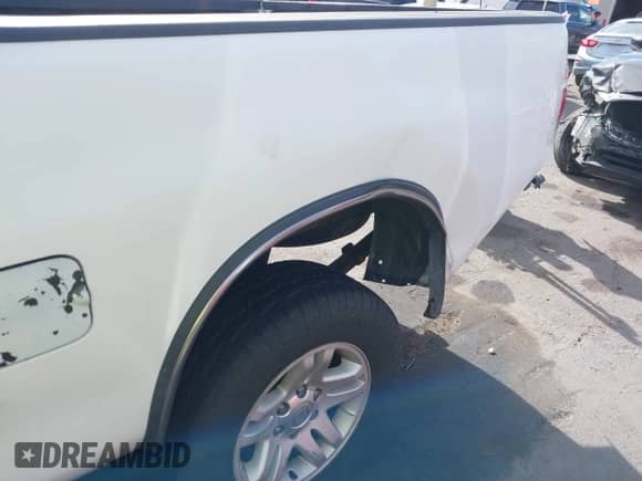 2004 Toyota Tundra SR5 z VIN 5TBBT44114S456028, wystawiony jako IAAI lot #43430467 z przebiegiem 230 434 mil mil oraz . Historia ofert i sprzedaży dostępna na DreamBid. Obrazek 18.