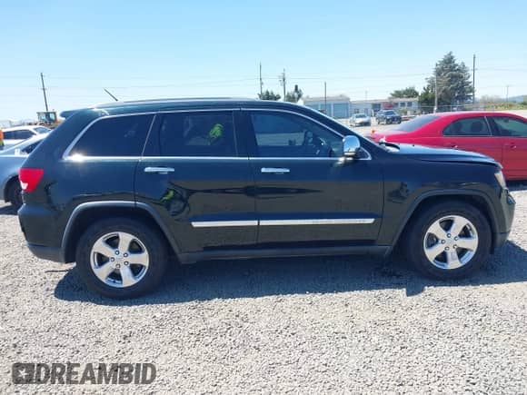 2012 Jeep Grand Cherokee Overland Summit z VIN 1C4RJFCT8CC274935, wystawiony jako IAAI lot #42711029 z przebiegiem 157 680 mil mil oraz . Historia ofert i sprzedaży dostępna na DreamBid. Obrazek 13.