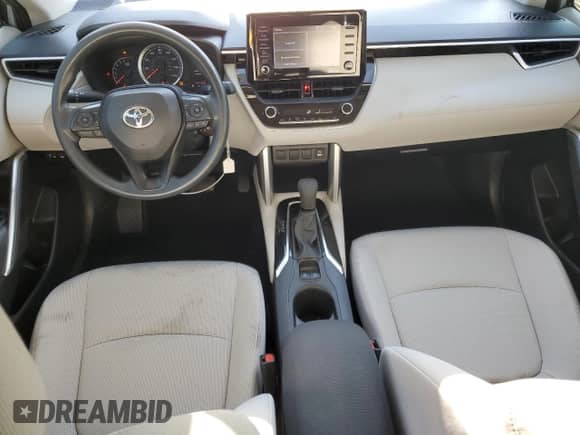 2022 Toyota Corolla Cross L with VIN 7MUAAABG7NV018734, listed as a Copart auction lot 69626985 with 27,871 mi miles and Salvage title. Bid and sale history available at DreamBid. Image 8.