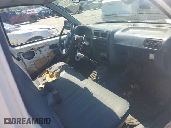 1994 Nissan Frontier с VIN 1N6SD11S7RC414811, выставлен на аукционе Copart как лот 65633535 с пробегом 234 730 миль миль и Списание • Salvage title. История ставок и продаж доступна на DreamBid. Изображение 8.