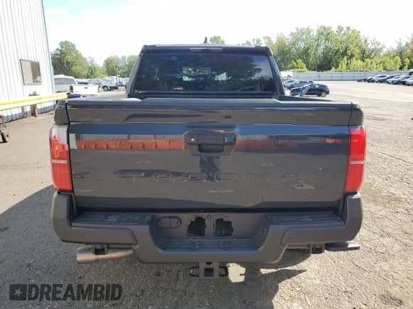 2024 Toyota Tacoma SR with VIN 3TYKD5HN0RT013601, listed as a Copart auction lot 69126575 with 4,033 mi miles and Salvage title. Bid and sale history available at DreamBid. Image 6.