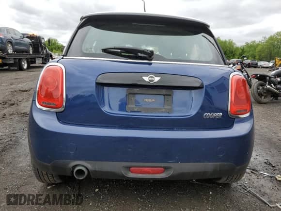 2016 MINI Hardtop with VIN WMWXP5C58G3B76219, listed as a Copart auction lot 57879225 with 94,245 mi miles and Salvage title. Bid and sale history available at DreamBid. Image 6.
