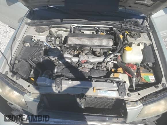 2005 Subaru Forester XT with VIN JF1SG69665H704751, listed as a Copart auction lot 63497125 with 188,843 mi miles and Salvage title. Bid and sale history available at DreamBid. Image 12.