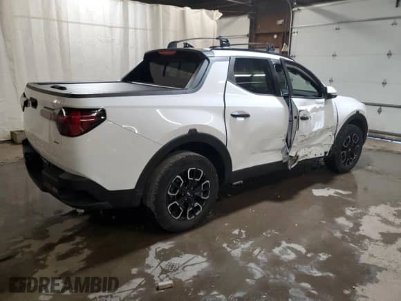 2022 Hyundai Santa Cruz SEL с VIN 5NTJCDAE5NH009205, выставлен на аукционе Copart как лот 77241474 с пробегом 32 417 миль миль и Списание • Salvage title. История ставок и продаж доступна на DreamBid. Изображение 3.