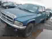 2003 Dodge Dakota SLT z VIN 1D7HG48N43S249020, wystawiony jako IAAI lot #41580449 z przebiegiem 240 500 mil mil oraz . Historia ofert i sprzedaży dostępna na DreamBid. Obrazek 2.